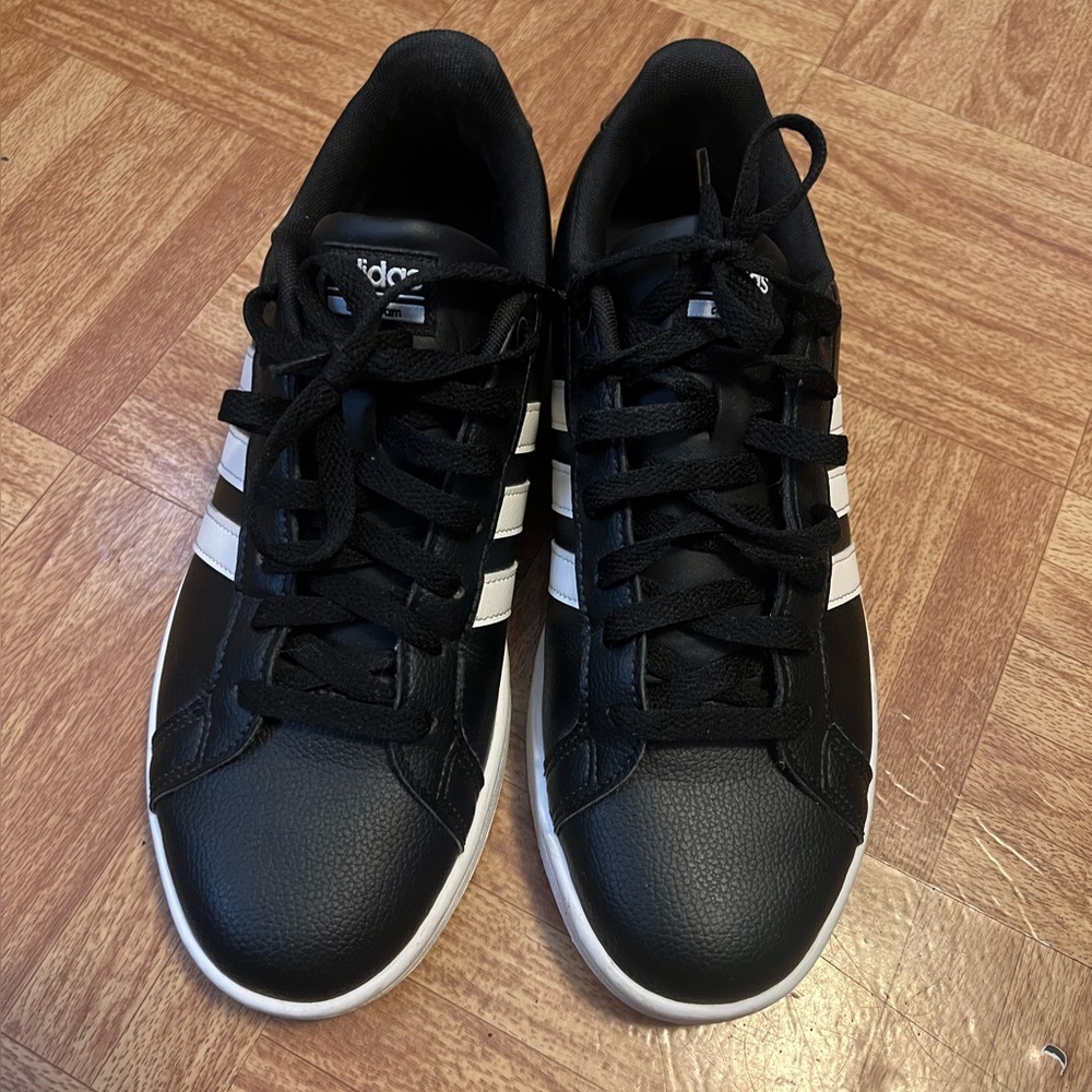 Adidas ortholite float women's leather sneaker black and white. Worn once.